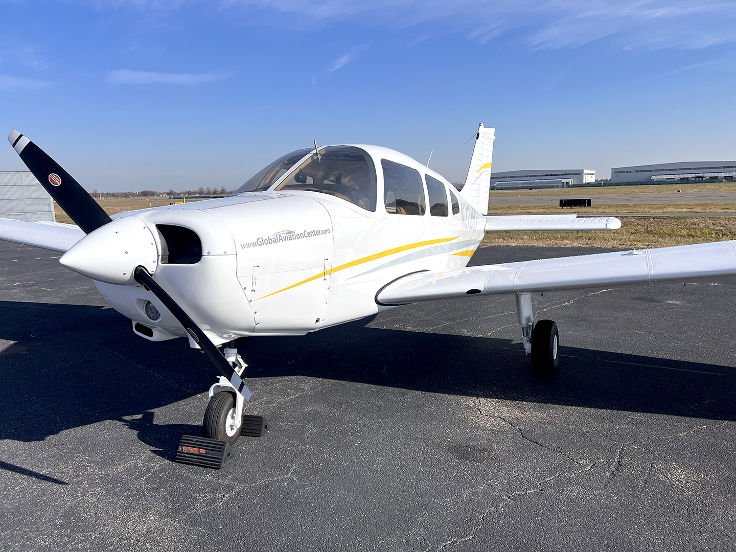Global Aviation Center Piper Warrior on the ramp at Republic Airport
